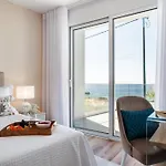 Апартаменты Coastal Charm By Homie